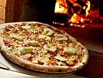 Pizza com cogumelos e alcachofrinha italiana, da Maremonti (Tadeu Brunelli/Divulgação)