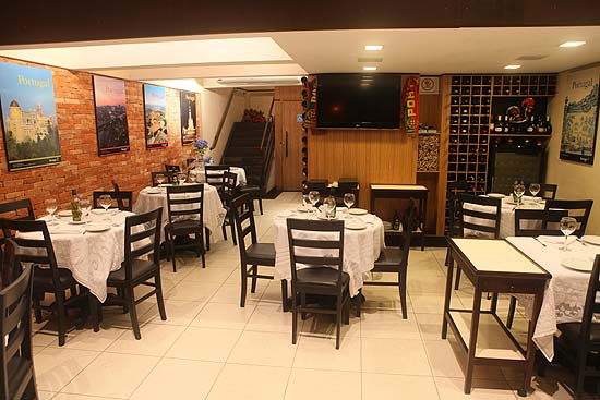 Ambiente do restaurante Rei do Bacalhau, que agora está no Itaim Bibi