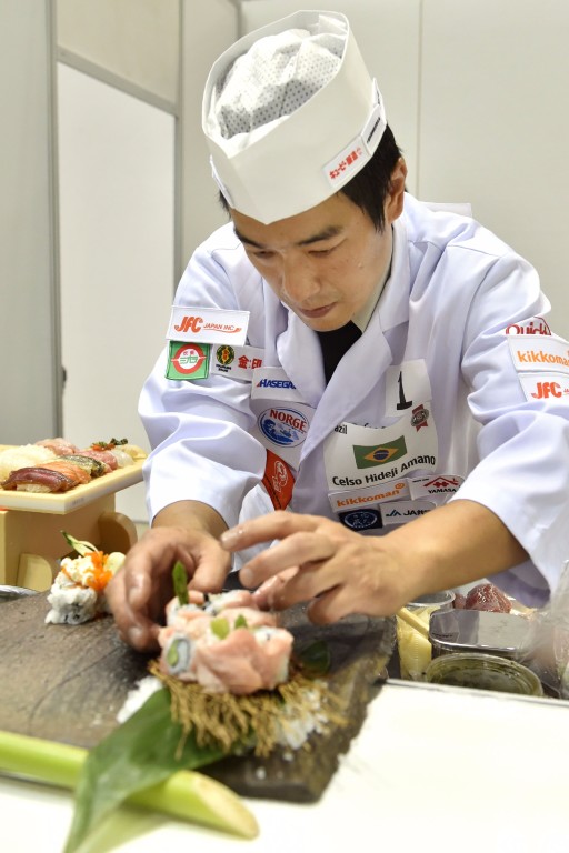 Hideji Celso Amano, a Brazilian of Japanese ancestry who was awarded first place, competes during the World Sushi Cup Japan 2016 in Tokyo on August 19, 2016.  Overseas sushi chefs competed for world s
