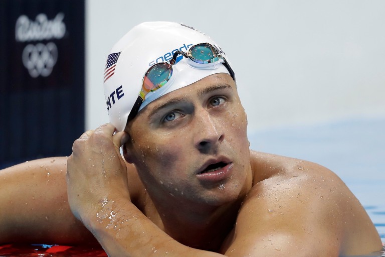 FILE - In this Tuesday, Aug. 9, 2016, file photo, United States' Ryan Lochte checks his time in a men's 4x200-meter freestyle heat during the swimming competitions at the 2016 Summer Olympics, in Rio 