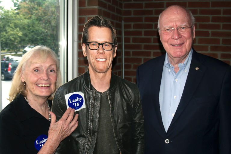 In this Aug. 1, 2016 photo provided by the Brattleboro Area Chamber of Commerce, U.S. Sen. Patrick Leahy, right, and his wife Marcelle pose with a life-size cardboard photo of actor Kevin Bacon in Bra