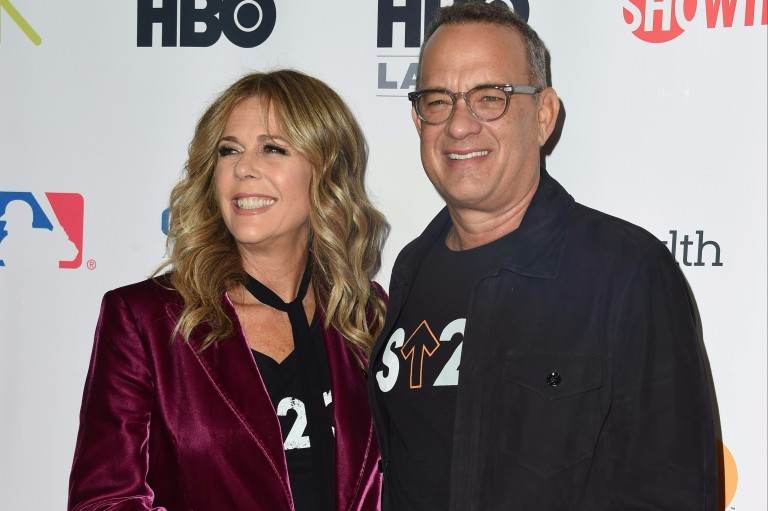 Actors Rita Wilson and Tom Hanks attend the Stand Up To Cancer (SU2C) event on September 9, 2016, at the Walt Disney Concert Hall in Los Angeles, California. / AFP PHOTO / Valerie MACON