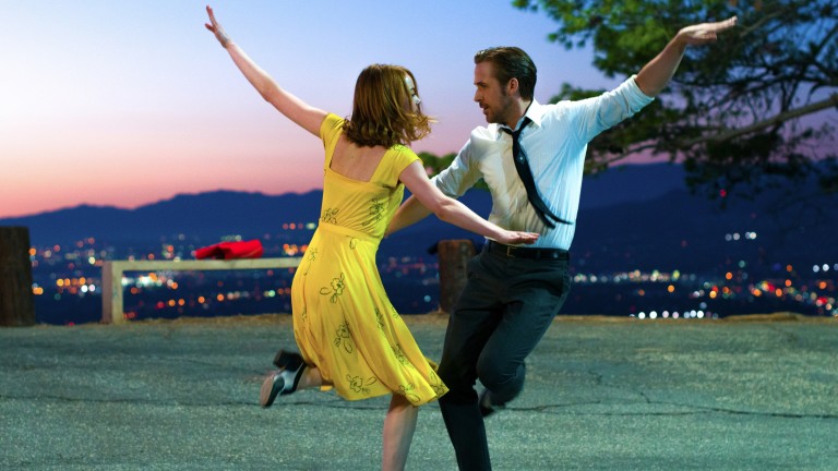 This image released by Lionsgate shows Ryan Gosling, right, and Emma Stone in a scene from, "La La Land." The Producers Guild of America has nominated awards season favorites La La Land, Moonlight