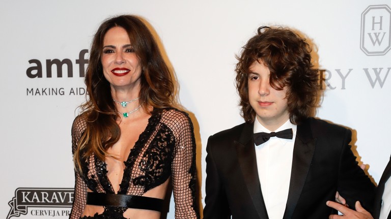 Brazilian model Luciana Gimenez and her son Lucas Jagger, the son of Mick Jagger, pose on the red carpet of The Foundation for AIDS Research (amfAR) event in Sao Paulo, Brazil, Thursday, April 27, 201