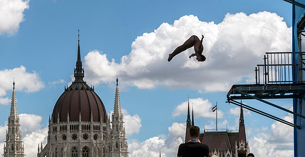 A diver practices two days prior to the high diving events at the Swimming World Championships at the Batthyany square in Budapest, Hungary, Wednesday, July 26 2017. (Zsolt Szigetvary/MTI via AP) ORG XMIT: MTI126