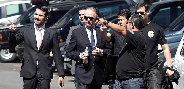 Brazilian Olympic Committee (COB) President Carlos Arthur Nuzman (C) arrives to Federal Police headquarters in Rio de Janeiro