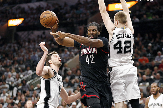 May 1, 2017; San Antonio, TX, USA; Houston Rockets center Nene Hilario (42) looks to pass the ball as San Antonio Spurs small forward Davis Bertans (42) and Pau Gasol (16) defend during the first half in game one of the second round of the 2017 NBA Playoffs at AT&T Center. Mandatory Credit: Soobum Im-USA TODAY Sports ORG XMIT: USATSI-359208