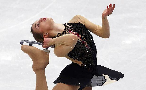 Brazil's Isadora Williams competes during the Figure Skating Women's Short Program at the Sochi 2014 Winter Olympics, February 19, 2014. REUTERS/David Gray (RUSSIA - Tags: OLYMPICS SPORT FIGURE SKATING) ORG XMIT: OLYB015