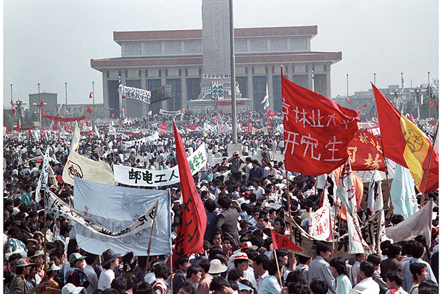 A combination picture shows people filling Tiananmen Square in front of the Mausoleum of late Chinese chairman Mao Zedong and the Monument to the People's Heroes in Beijing, May 17, 1989 (top) and cars passing the same place May 31, 2016. REUTERS/Ed Nachtrieb/File Photo and Kim Kyung-Hoon (bottom) ORG XMIT: DSB03