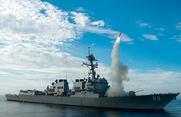 In this image obtained from the US Navy, the guided-missile destroyer USS Preble conducts an operational tomahawk missile launch while underway in a training area off the coast of California, on September 29, 2010. US President Donald Trump ordered a massive military strike against a Syria on April 6, 2017, in retaliation for a chemical weapons attack they blame on President Bashar al-Assad. A US official said 59 precision guided missiles hit Shayrat Airfield in Syria, where Washington believes Tuesday's deadly attack was launched. / AFP PHOTO / US NAVY / Woody PASCHALL / RESTRICTED TO EDITORIAL USE - MANDATORY CREDIT "AFP PHOTO / US NAVY / Mass Communication Specialist 1st Class Woody Paschall" - NO MARKETING NO ADVERTISING CAMPAIGNS - DISTRIBUTED AS A SERVICE TO CLIENTS ORG XMIT: USS Preble (DDG 88)