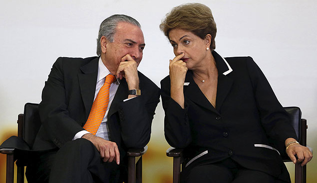 Brazil's President Dilma Rousseff (R) listens to Vice President Michel Temer during a ceremony for the launch of the National Plan for Export at the Planalto Palace in Brasilia, Brazil, June 24, 2015. REUTERS/Bruno Domingos ORG XMIT: BSB102