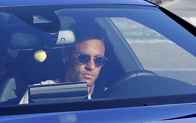 Brazilian soccer player Neymar drives to arrive to Joan Gamper training camp near Barcelona, Spain, August 2, 2017.