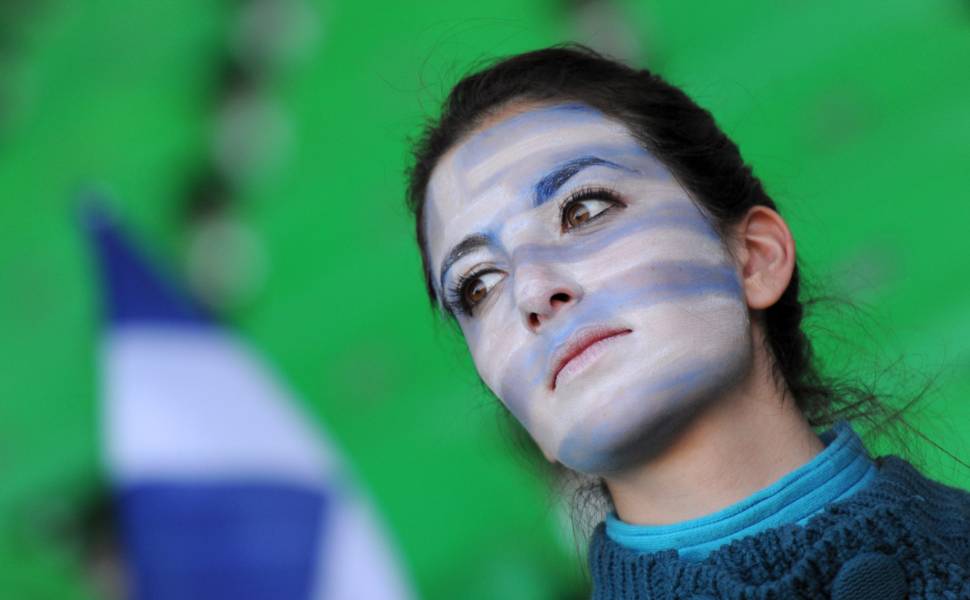 Torcedores com rosto pintados