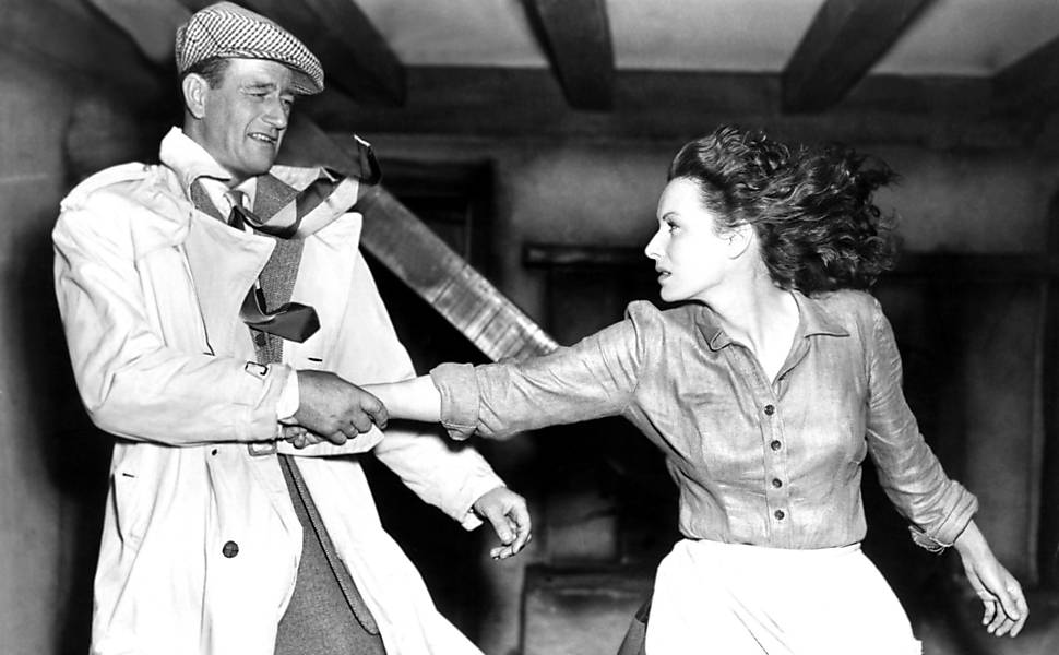 John Wayne e Maureen O'Hara em uma cena clássica de "Depois do Vendaval" (1952), que 40 anos depois seria homenageada por Steven Spielberg no filme "E.T." (1982)