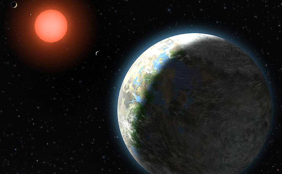 O exoplaneta Gliese 581g (em primeiro plano na imagem) foi considerado o mais parecido com a Terra <a href='http://www1.folha.uol.com.br/bbc/1011422-estudo-identifica-planetas-com-mais-chance-de-abrigar-vida-extraterrestre.shtml'>Leia Mais</a>
