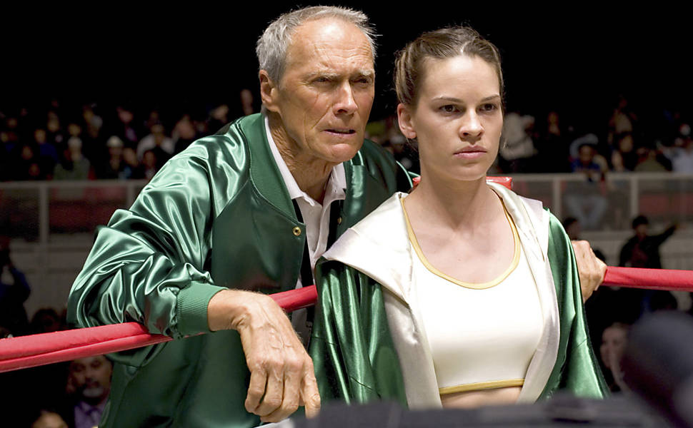 Hilary Swank e Eastwood em cena de "Menina de Ouro" (2004)
