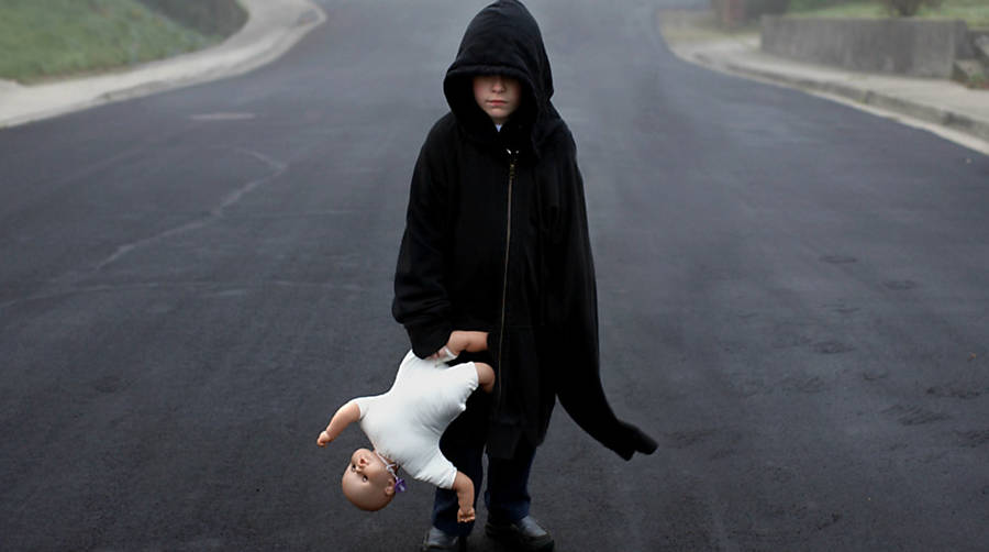 Americano cria conexão com filho autista em ensaio de fotos