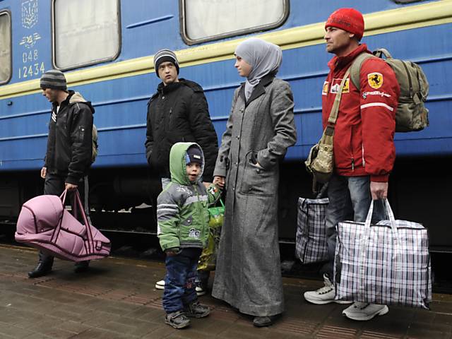 Famílias deixam a região da Crimeia