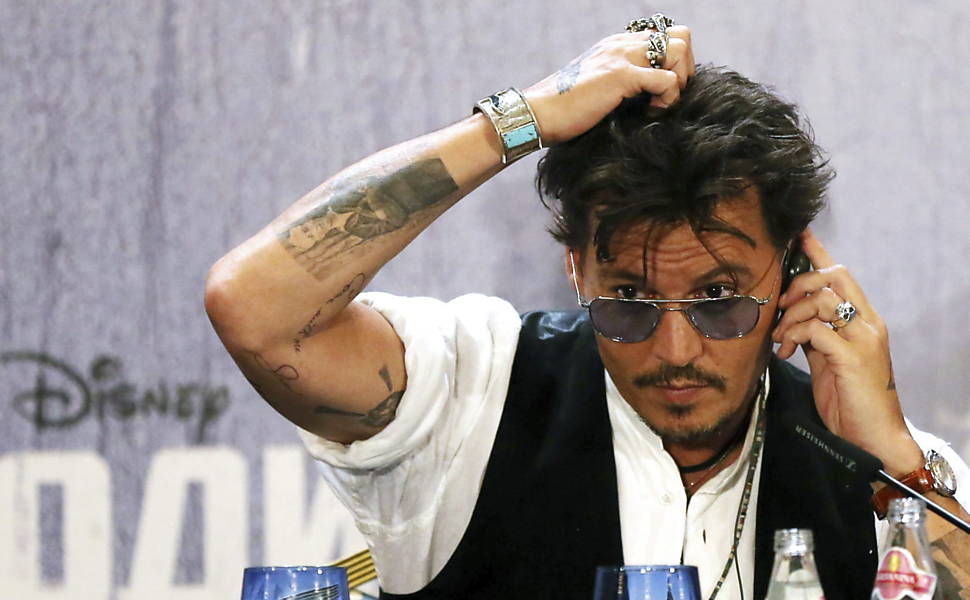 Johnny Depp vive relacionamento com advogada que está se divorciando,  afirma site - Estrelando