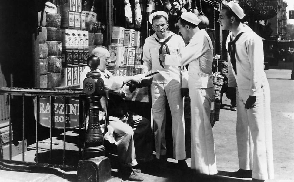 FILM STILL --   ON THE TOWN, from center:  Frank Sinatra, Gene Kelly, Jules Munshin, 1949