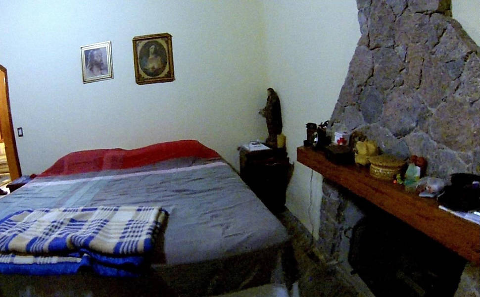 Suíte com lareira da casa principal