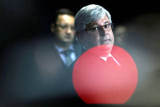 Brazil's Attorney General Rodrigo Janot looks on during news conference after a forum titled 