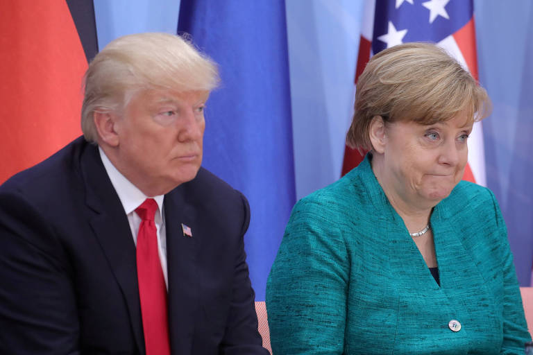 FILE PHOTO: U.S. President Donald Trump and German Chancellor Angela Merkel attend the Women?s Entrepreneurship Finance event during the G20 leaders summit in Hamburg, Germany July 8, 2017. REUTERS/Michael Kappeler/Pool/File Photo ORG XMIT: HFS - RKR100