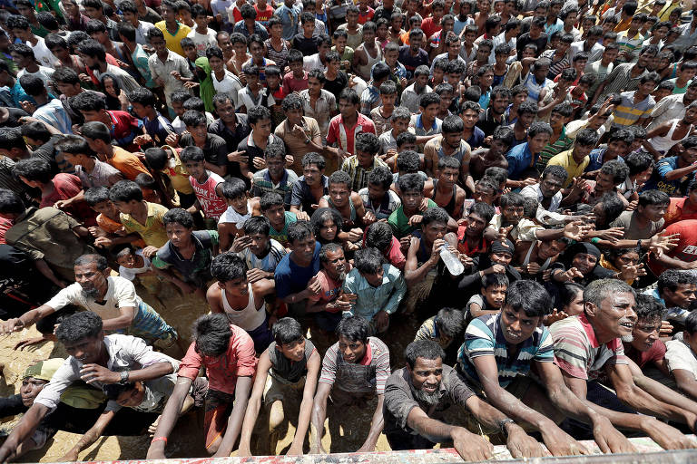 Rohingyas fogem de viol�ncia 
