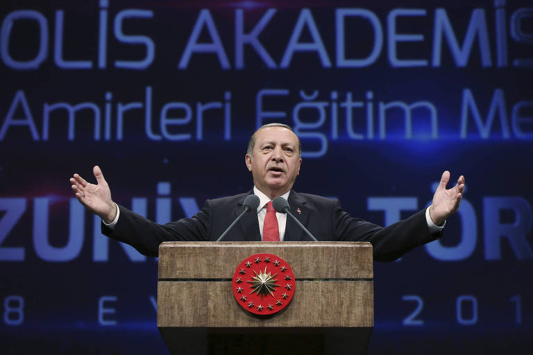Turkey's President Recep Tayyip Erdogan addresses a police academy graduation ceremony at his palace in Ankara, Turkey, Thursday, Sept. 28, 2017. Erdogan says Iraq's Kurdish region has 