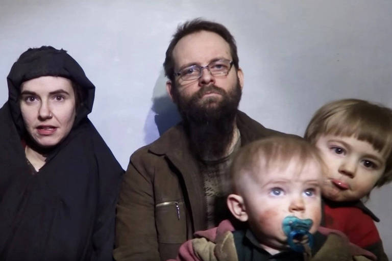 A still image from a video posted by the Taliban on social media on December 19, 2016 shows American Caitlan Coleman (L) speaking next to her Canadian husband Joshua Boyle and their two sons. Taliban/Social media via Reuters ATTENTION EDITORS - THIS IMAGE HAS BEEN SUPPLIED BY A THIRD PARTY. FOR EDITORIAL USE ONLY. NO RESALES. NO ARCHIVESS ORG XMIT: SIN900