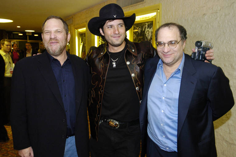 Os produtores cinematogrficos Harvey Weinstein (esq.), Robert Rodriguez e Bob Weinstein