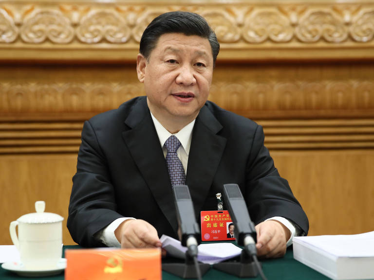 O líder chinês, Xi Jinping, preside uma das reuniões do Congresso do Partido Comunista nesta segunda – Lan Hongguang/Xinhua O líder chinês, Xi Jinping, preside uma das reuniões do Congresso do Partido Comunista nesta segunda – Lan Hongguang/Xinhua