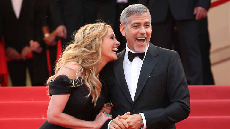 George Clooney e Julia Roberts durante a estreia de 'Jogo do Dinheiro', em 2016