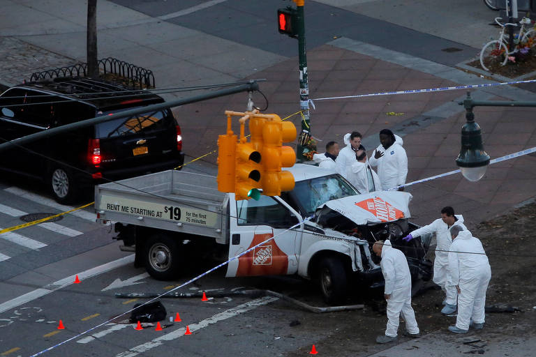 Police investigate a vehicle allegedly used in a ramming incident on the West Side Highway in Manhattan, New York, U.S.