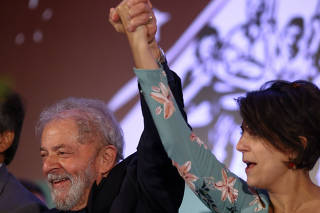 O ex-presidente Lula e Manuela D'Ávila durante o Congresso Nacional do PC do B 