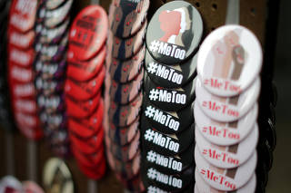 FILE PHOTO:    A vendor sells #MeToo badges a protest march for survivors of sexual assault and their supporters in Hollywood, Los Angeles