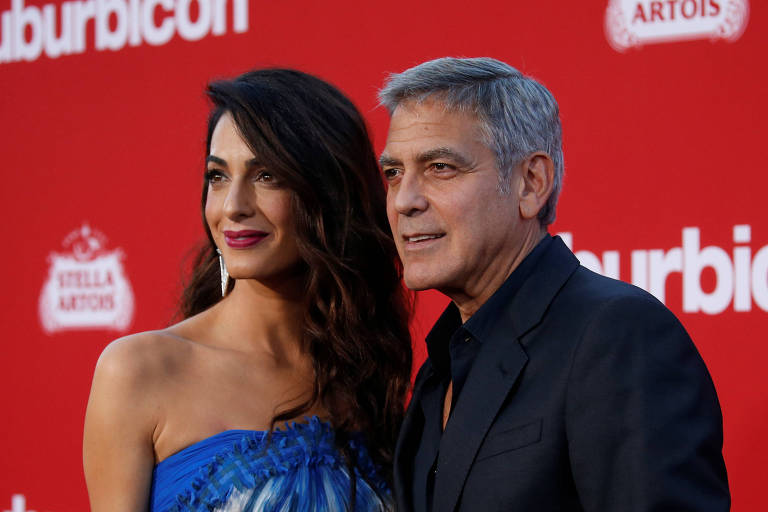 George Clooney  dá fones de ouvido a passageiros em avião para abafar choro dos filhos