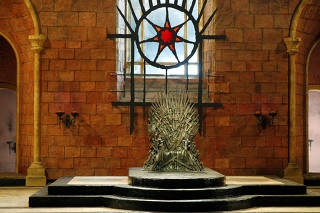 The Iron Throne is seen on the set of the television series Game of Thrones in the Titanic Quarter of Belfast, Northern Ireland