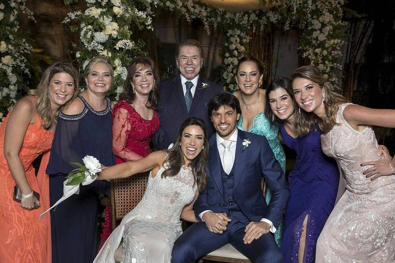 Silvio Santos com as filhas e a esposa no casamento de Patricia Abravanel