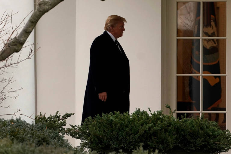 O presidente norte-americano Donald Trump caminha em direção ao Salão Oval
