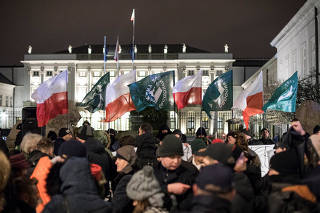 Supporters of the far-right National Radical Camp (ONR) gather in support of the Holocaust bill in front of the Presidential Palace in Warsaw