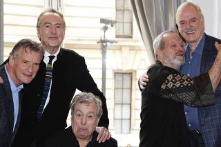 The surviving members of the original cast of the Monty Python comedy team Palin, Idle, Jones, Gilliam and Cleese, pose for photographers at a photocall in central London