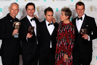 Martin McDonagh, Peter Czernin, Sam Rockwell and Graham Broadbent, pose with Frances McDormand, as they hold their trophies for Best Film for 'Three Billboards Outside Ebbing Missouri' at the British Academy of Film and Television Awards in London