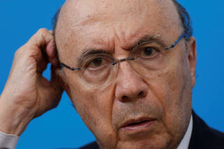 Brazil's Finance Minister Henrique Meirelles reacts during a news conference in Brasilia