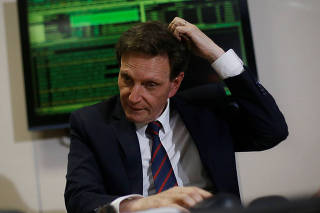 Rio de Janeiro's Mayor Crivella gestures during a meeting with Brazil's Finance Minister Meirelles in Brasilia
