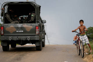 Armed forces members leave the Milton Dias Moreira penitentiary after an inspection operation in Japeri, near Rio de Janeiro