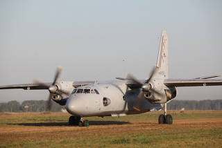 A Russian military transport plane An-26 is seen of the unpaved runway of the Shagol airfield in Chelyabinsk region