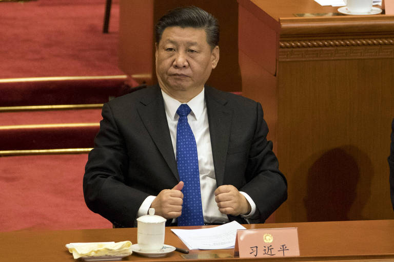 O líder chinês, Xi Jinping, participa da abertura do evento que emendou a Constituição do país para que ele tenha mandatos indefinidos