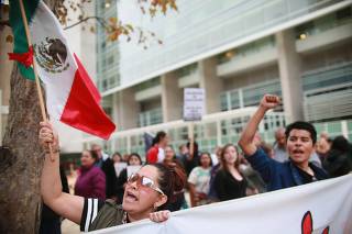 Protestors Rally In San Diego Ahead Of President Trump's Visit