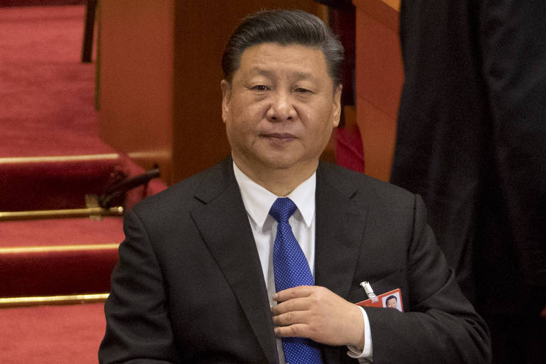 O líder chinês, Xi Jinping, participa de sessão plenária do Congresso Nacional do Povo nesta segunda-feira (19) em Pequim